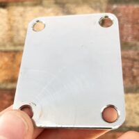 Unbranded 4 bolt neck plate. Fits perfectly on Fender guitars - $5