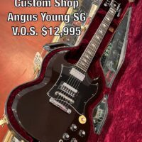 2009 Gibson Custom Shop Angus Young SG V.O.S. w/ohsc, cert, & case candy - $12,995 This is no. 191 of 200 made.