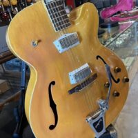 1961 Epiphone Broadway w/ohsc - $1,895 Top has had some overspray and repairs. Bridge, tuners, pickups, knobs, and Bigsby all added by previous owner.