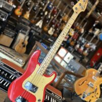 1975 Fender Precision bass w/hsc. Previous owner had body over sprayed in red and changed pick guard & strap buttons. Original natural finish is still intact underneath. Original otherwise. - $1,895